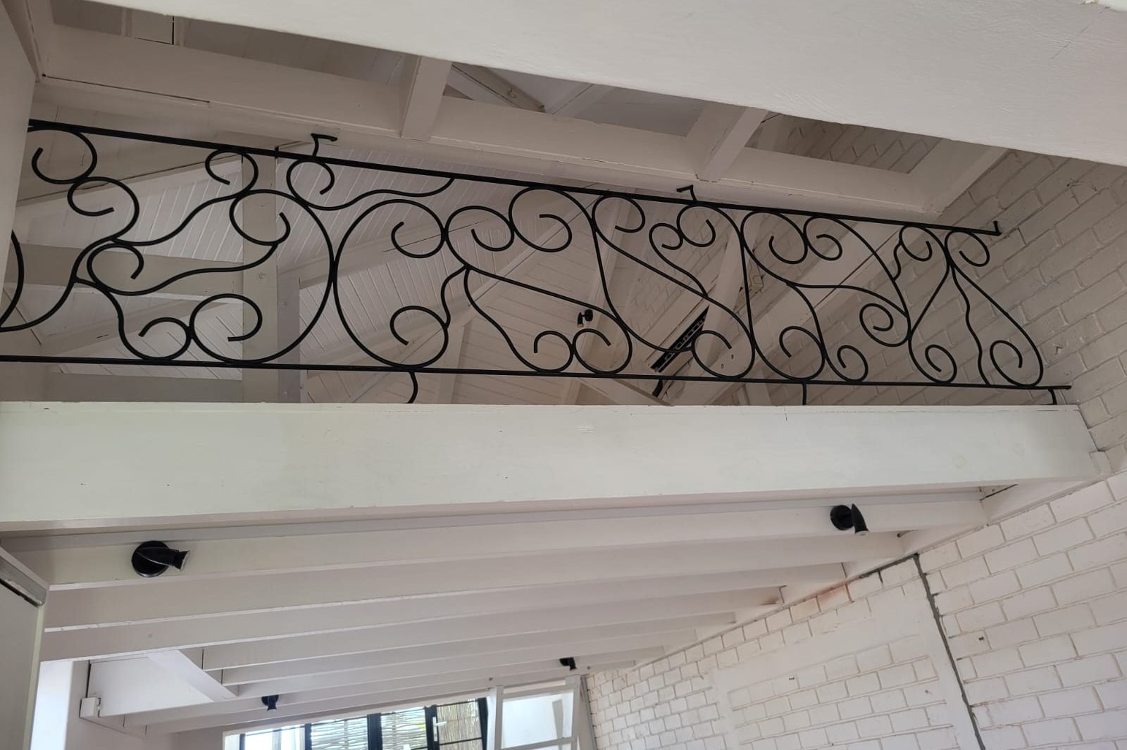 Ornamental scroll balustrade by The Classic Forge